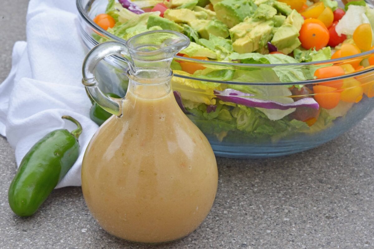 Roasted Jalapeno and Onion Dressing Recipe is a new way to jazz up your leafy greens or your favorite roasted or grilled vegetables. #jalapeno #saladdressing #caramelizedonion www.savoryexperiments.com