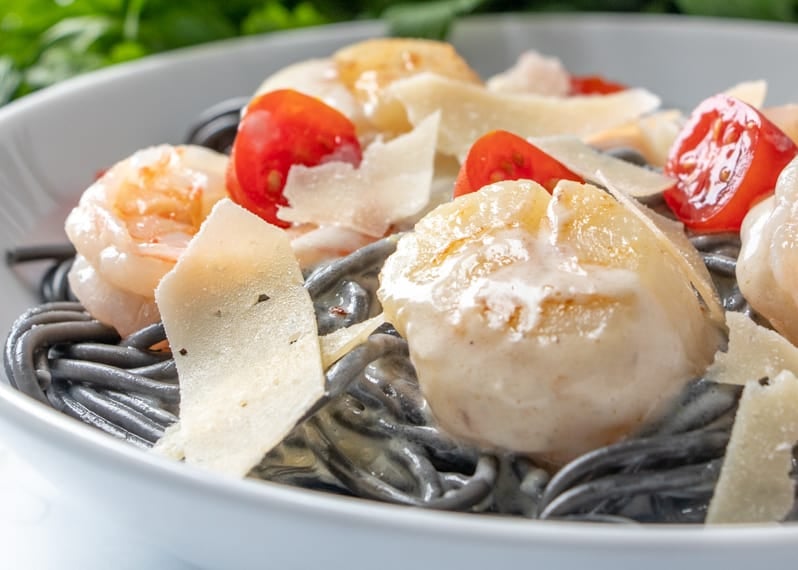 Angle shot of pasta with cream sauce