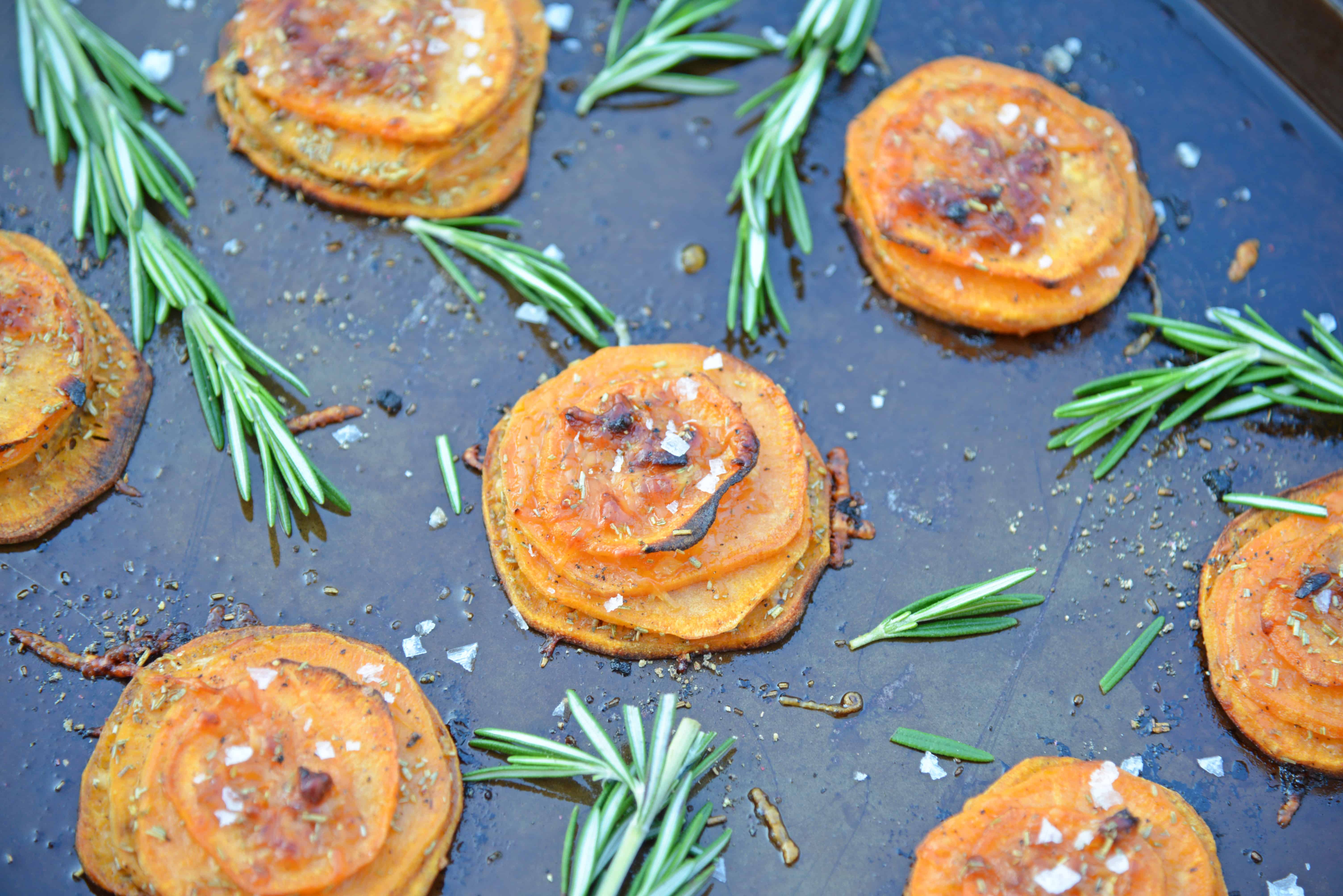 Rosemary Sweet Potato Stacks are a simple and visually appealing side dish or appetizer fit for any occasion. #sweetpotatostacks #sweetpotatoes www.savoryexperiments.com