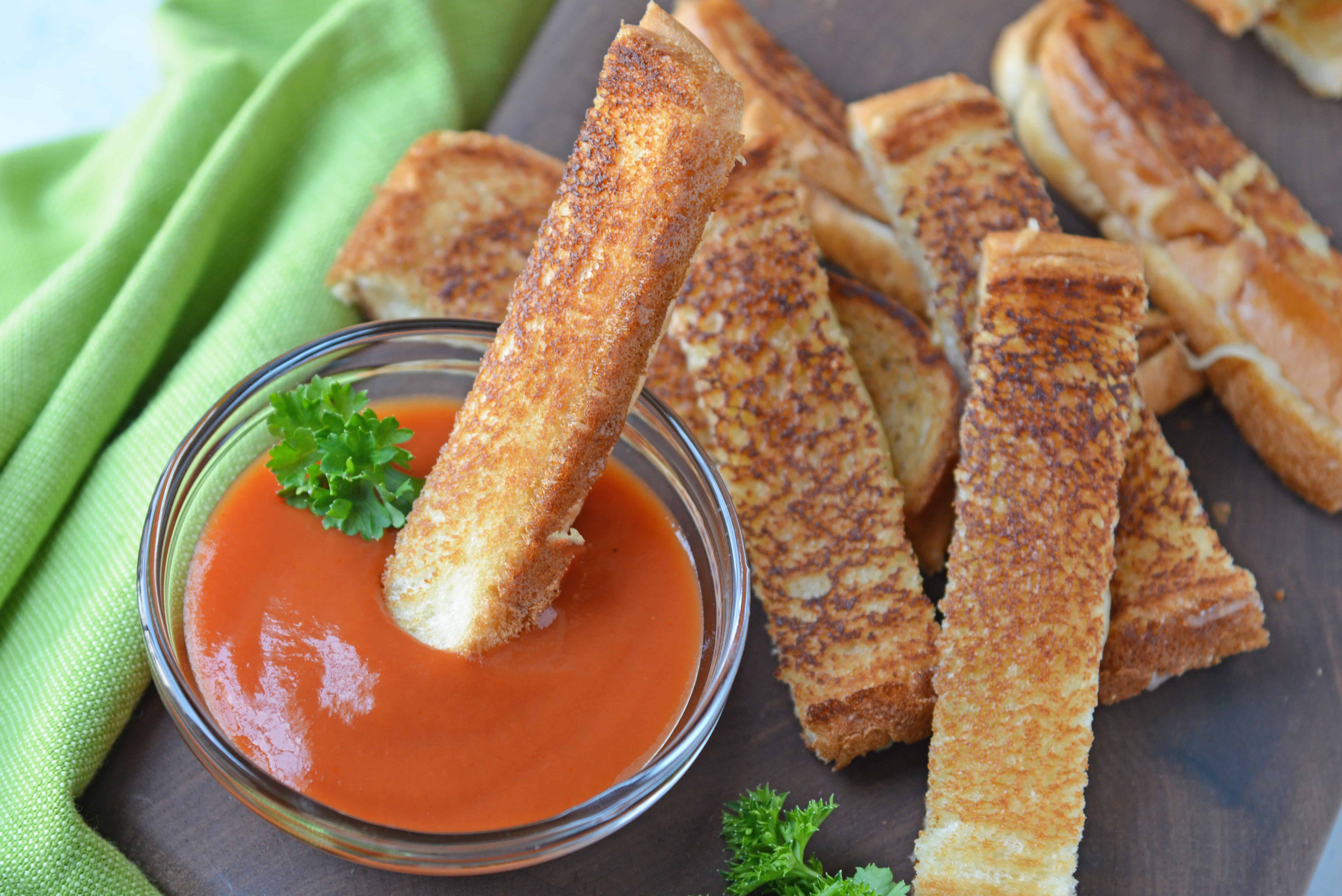 Grilled Cheese Sticks make your childhood favorite into a party-worthy appetizer! Pair with tomato soup or tomato jam for an upscale grilled cheese sandwich recipe. #grilledcheeserecipe www.savoryexperiments.com 