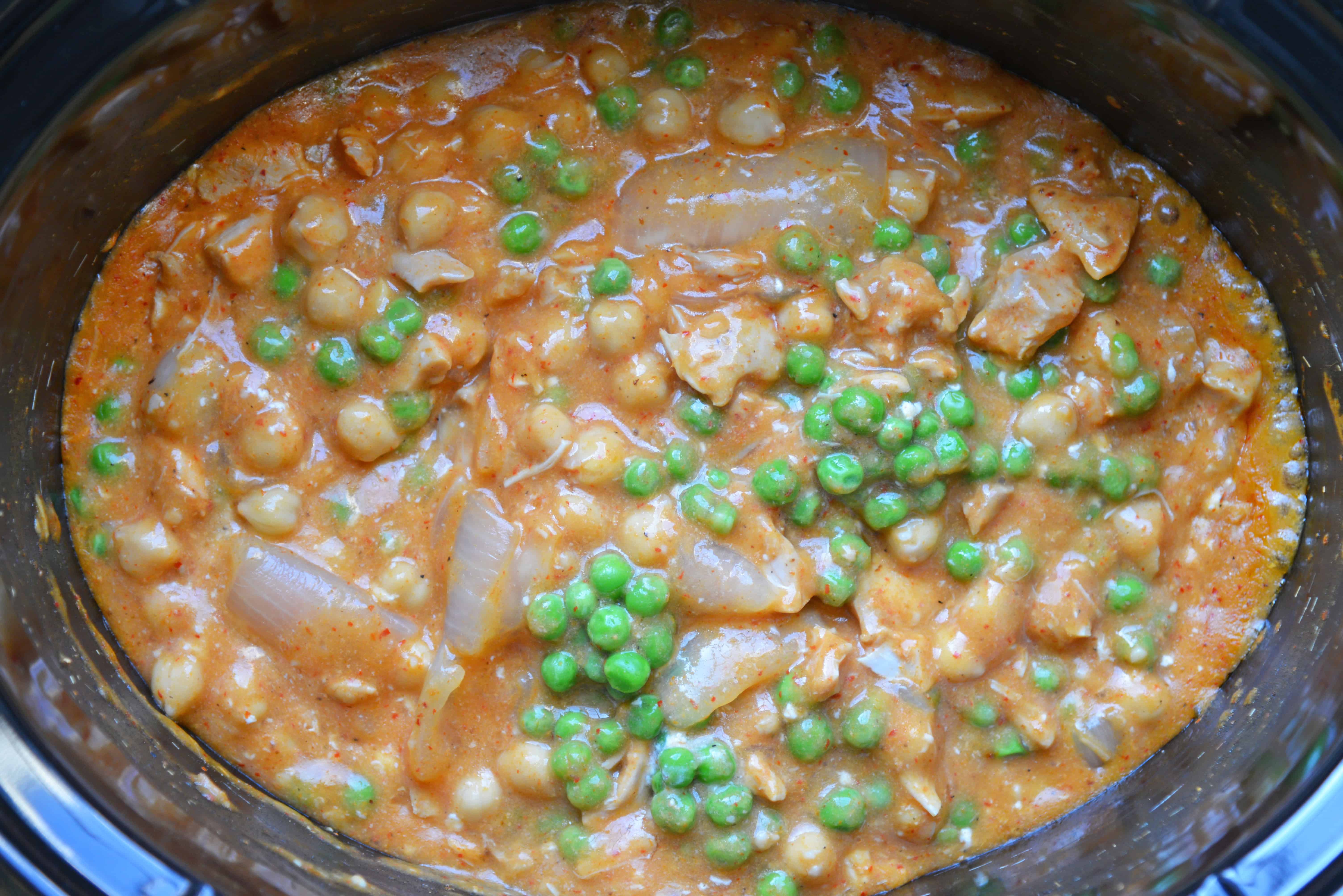 Slow Cooker Chicken Korma is a healthier way to prepare dinner! Only 10 minutes of prep time and into the pot! Loaded with dietary fiber and protein. #chickenkorma #easyindianrecipes #redcurryrecipes www.savoryexperiments.com