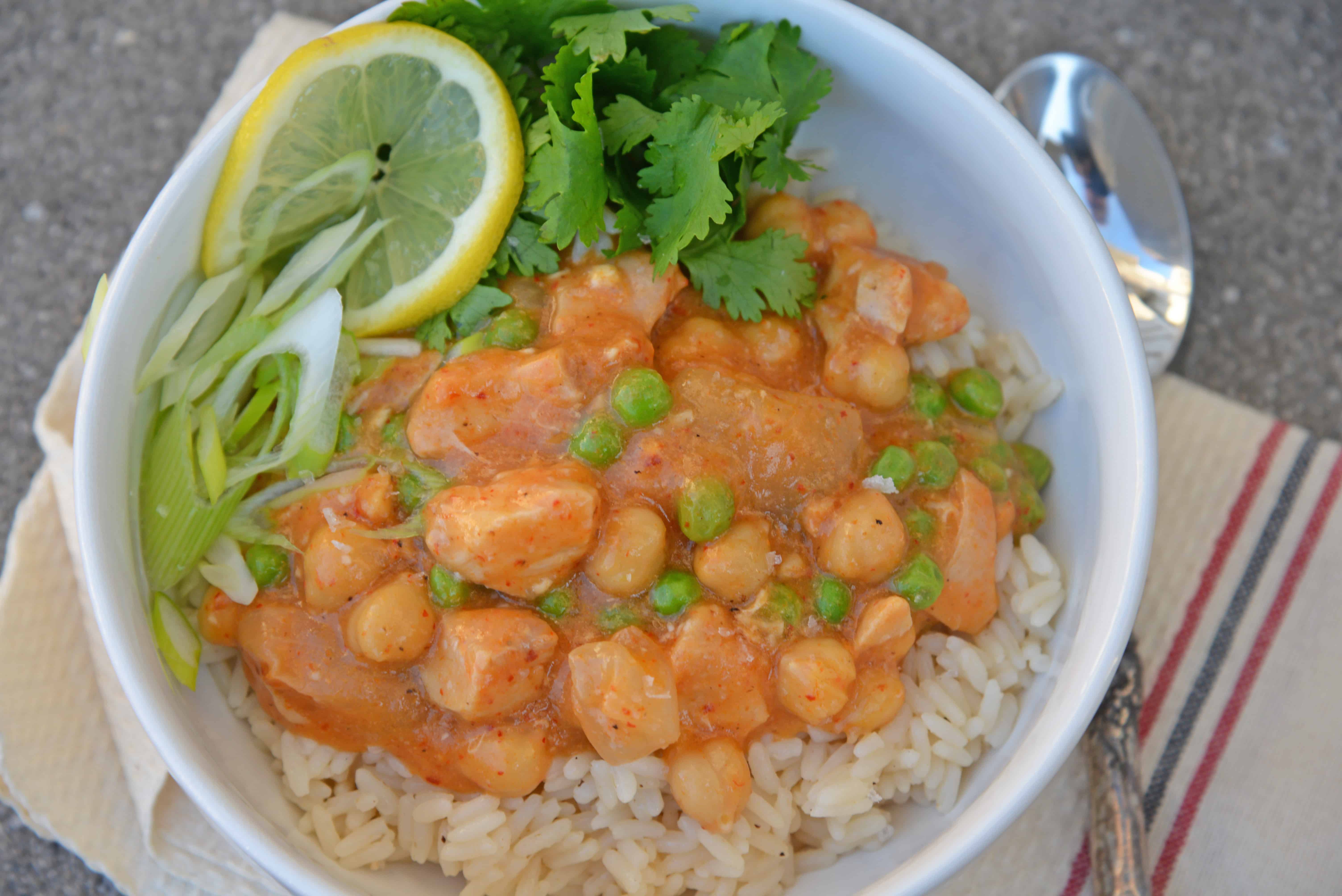 Slow Cooker Chicken Korma is a healthier way to prepare dinner! Only 10 minutes of prep time and into the pot! Loaded with dietary fiber and protein. #chickenkorma #easyindianrecipes #redcurryrecipes www.savoryexperiments.com