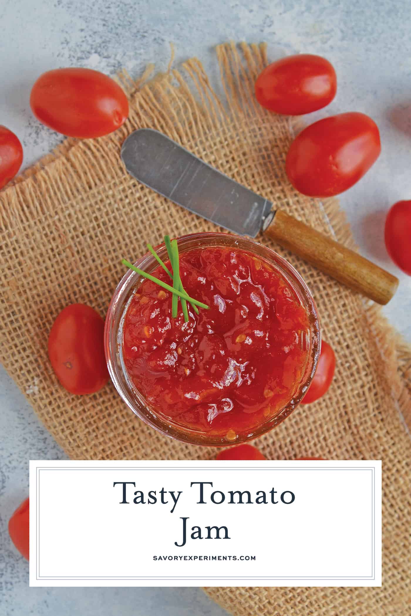 overhead of tomato jam in a small glass jar