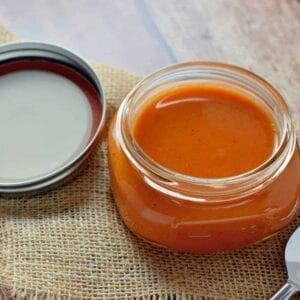 Red enchilada sauce in a jar