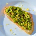 Serve Lemony Pea Mash Crostinis with at room temperature with a chilled, crisp white wine for a vibrant and colorful appetizer. | #peacrostinis | www.savoryexperiments.com