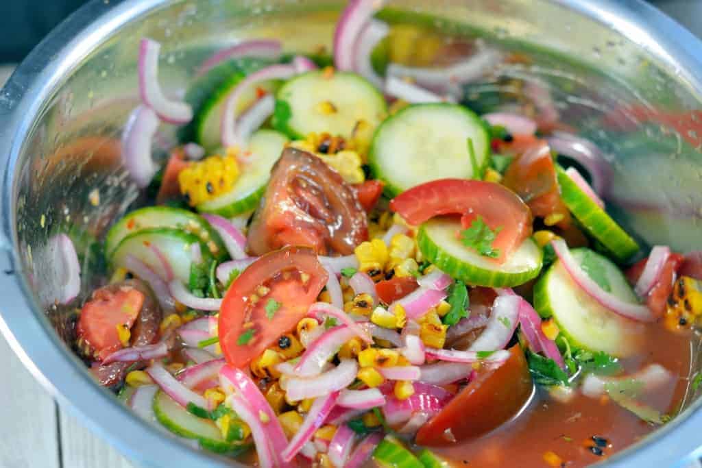 Grilled Corn, Tomato and Cucumber Salad Recipe- grilled corn and farmer's market vegetables with Asian flair. | #cucumbersalad | www.savoryexperiments.com