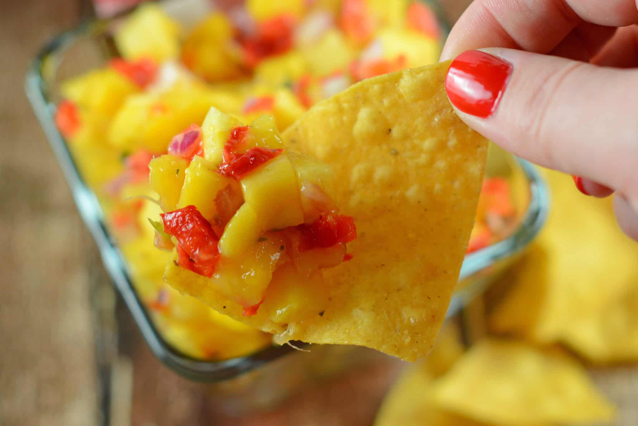 Easy Mango Salsa Recipe - Fresh mango salsa recipe, perfect for tacos, potlucks and more! www.savoryexperiments.com
