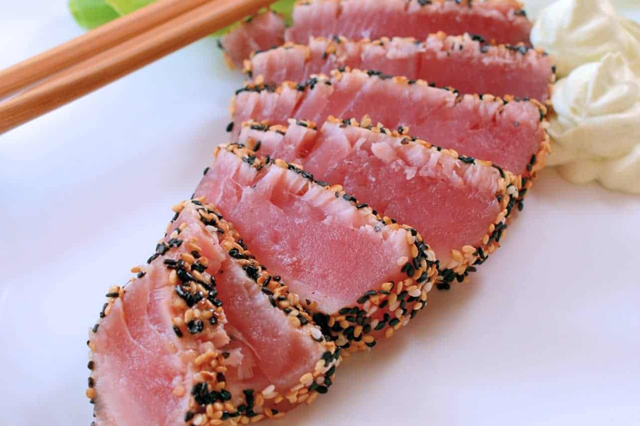 Sesame Crusted Tuna with Wasabi Whipped Cream is an easy and healthy meal that comes together in 15 minutes. #tunarecipe #tunasteakrecipe www.savoryexperiments.com