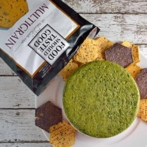 Layered Two Pesto and Ricotta Dip recipe features three distinct layers of red and green pesto with blended cheeses paired with Food Should Taste Good™ chips. | #foodshouldtastegood #sp | www.savoryexperiments.com