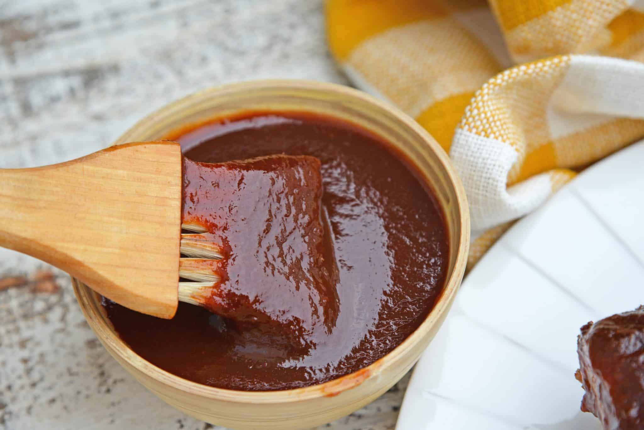 Zesty Cola BBQ Sauce is delicious on anything grilled including chicken, ribs, brisket and pulled pork. It only takes 10 minutes to make! #colabbqsauce #homemadebbqsauce www.savoryexperiments.com