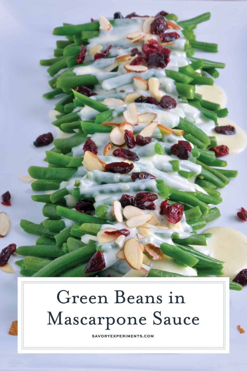 green beans in a cheese sauce on a white serving dish 