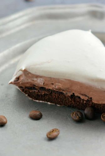 Mocha Cream Pie Recipe is three layers of delicious pie: brownie base, chocolate pudding, and whipped cream top all laced with coffee. #mochacreampie #brownies #creampie www.savoryexperiments.com