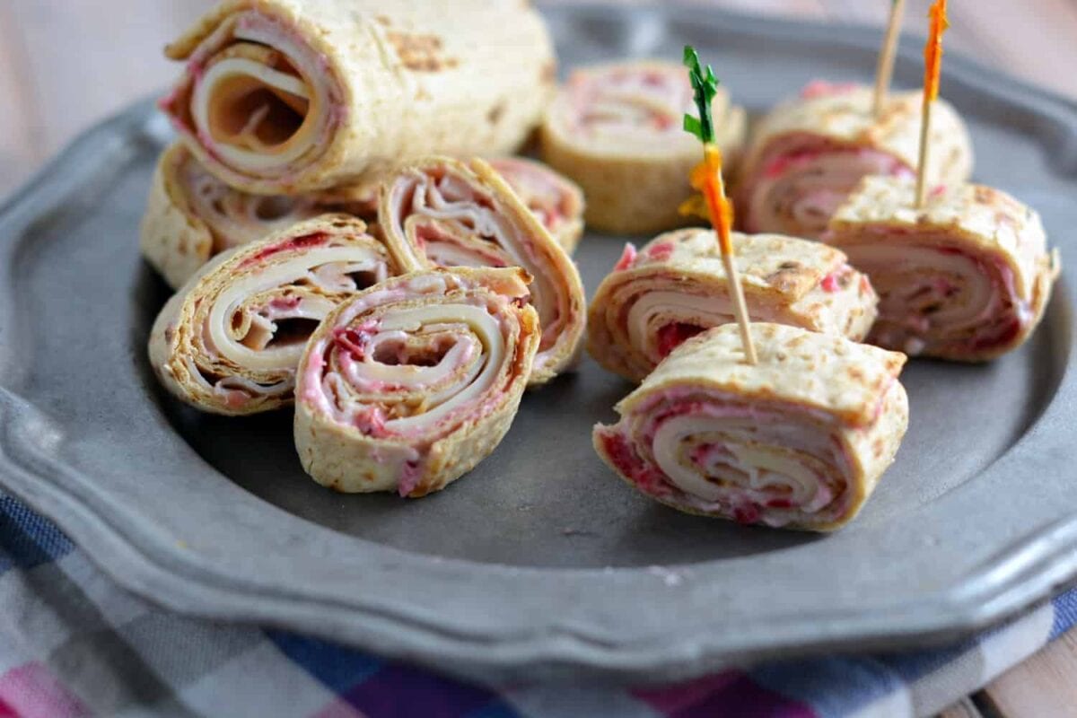 Turkey, Swiss and Cranberry Mayo Roll-Ups- the perfect way to use your Thanksgiving leftovers for a fresh, new meal! #cra
