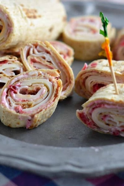 Turkey, Swiss and Cranberry Mayo Roll-Ups- the perfect way to use your Thanksgiving leftovers for a fresh, new meal! #cra