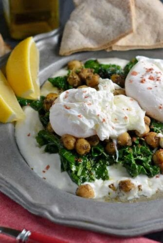 Za’atar Chickpeas and Poached Eggs is a refreshing, health and gluten-free breakfast option. Lemon zested yogurt sauce, za’atar spiced chickpeas, wilted spinach and poached eggs sprinkled with pink sea salt.