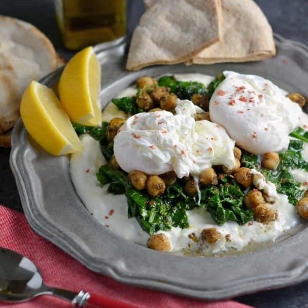 Za’atar Chickpeas and Poached Eggs is a refreshing, health and gluten-free breakfast option. Lemon zested yogurt sauce, za’atar spiced chickpeas, wilted spinach and poached eggs sprinkled with pink sea salt.