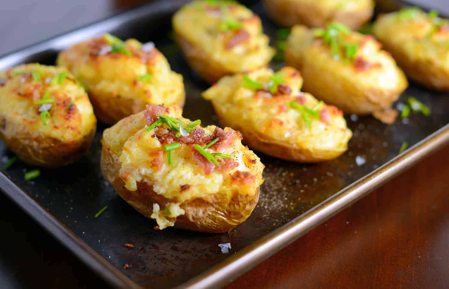 These cheesy twice baked potatoes are the BEST! My whole family gobbles them up, so I make double. The secret ingredient really makes these POP and stand out from the rest.
