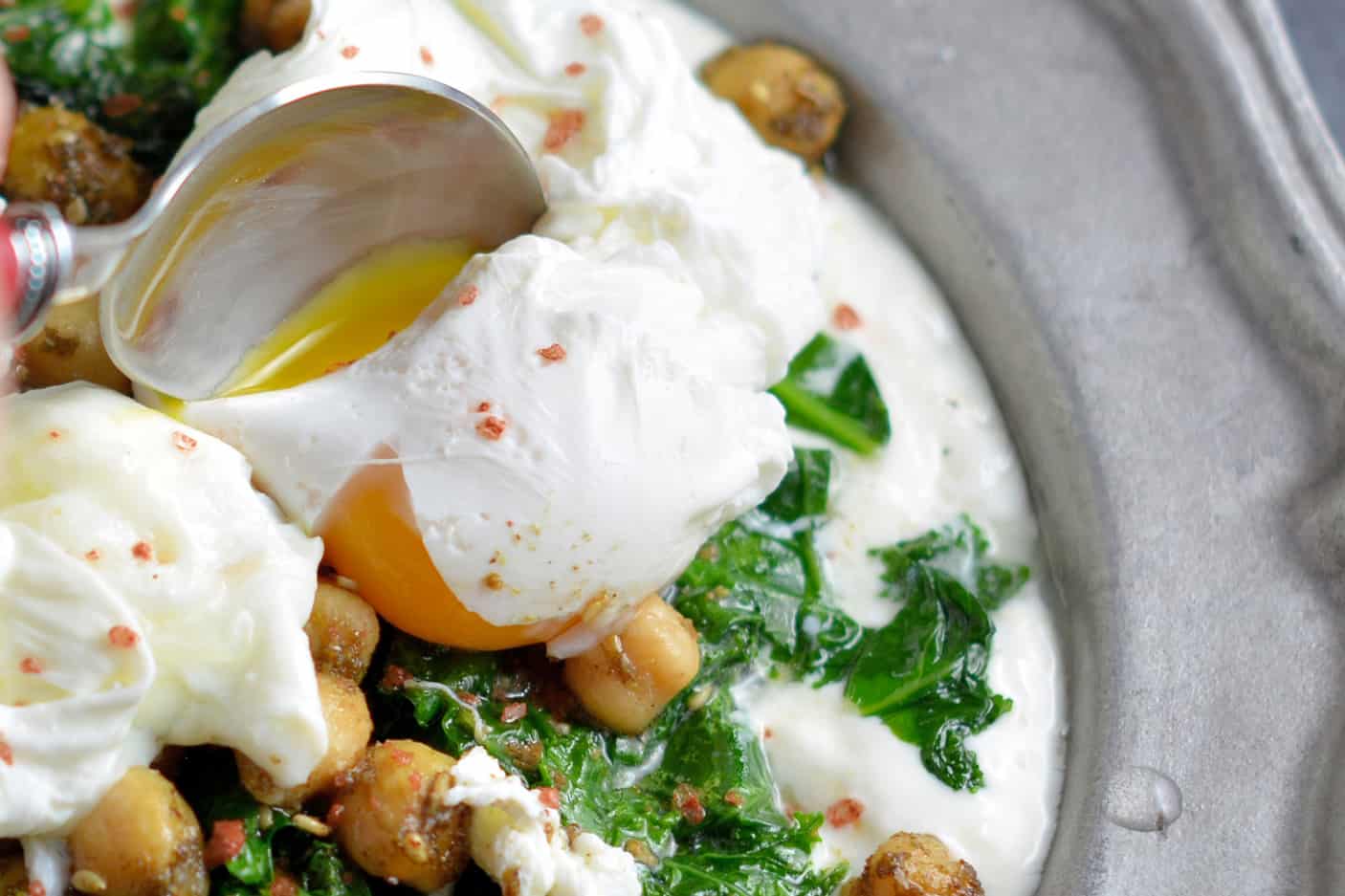 Gluten-Free Chickpeas and Poached Eggs are a healthy meal idea using yogurt, spinach and mediterranean spices. #poachedeggs www.savoryexperiments.com