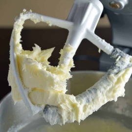 This classic Vanilla Buttercream Frosting is easy to make, delicious and perfect for frosting cakes, cupcakes and cookies! This is the same recipe that professional bakeries use!
