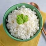 Cilantro-Lime Coconut Rice - The only way to eat rice! Flavored with coconut milk, fresh cilantro or Thai basil and citrus zest!