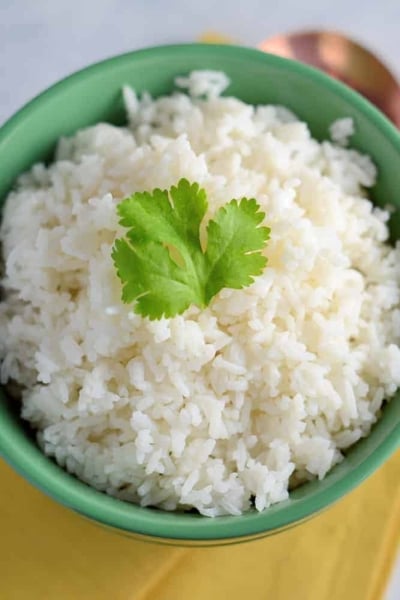 Cilantro-Lime Coconut Rice - The only way to eat rice! Flavored with coconut milk, fresh cilantro or Thai basil and citrus zest!