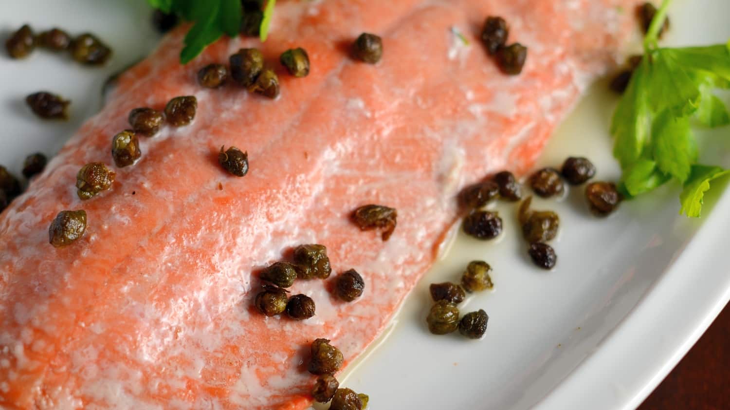 Crispy Caper Lemon Salmon is one of the best healthy salmon recipes. This lemon salmon is quick, easy and healthy! Crispy capers add texture sophistication to this easy weeknight meal.