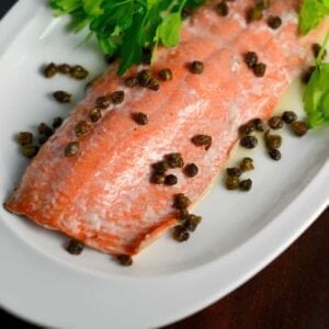 Crispy Caper Lemon Salmon is one of the best healthy salmon recipes. This lemon salmon is quick, easy and healthy! Crispy capers add texture sophistication to this easy weeknight meal.