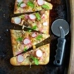 Horseradish and Mushroom Flatbread can be served as an appetizer or entree, perfect for your vegetarian friends, but hearty enough for meat-eaters. A mushroom blend, fresh radishes, pickled red onion, tangy horseradish cheddar cheese, Italian parsley and Maldon sea salt make this one of the best dishes you will ever eat!