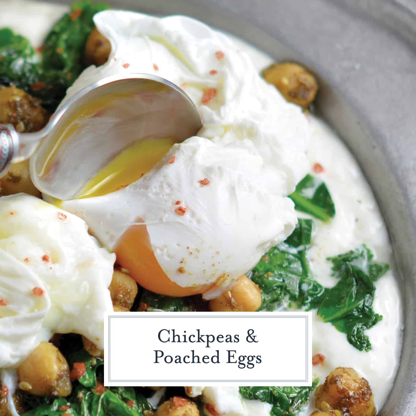 Spoon digging into a runny poached egg yolk