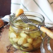 glass jar of garlic confit