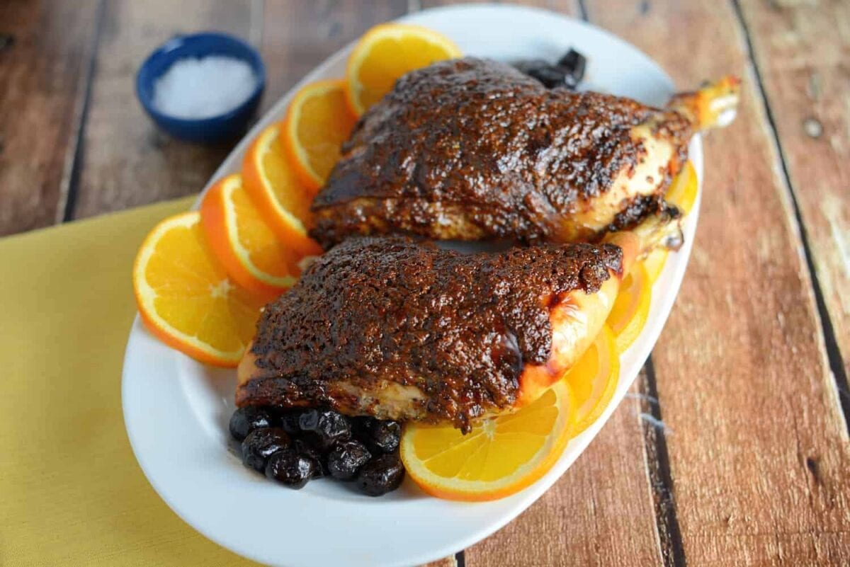 Orange Marmalade with orange, tarragon and olives make this delicious, sticky crust for French Baked Chicken. Use on chicken halves or chicken breasts for a delicious French dinner recipe. #frenchchicken #bakedchickenrecipe www.savoryexperiments.com