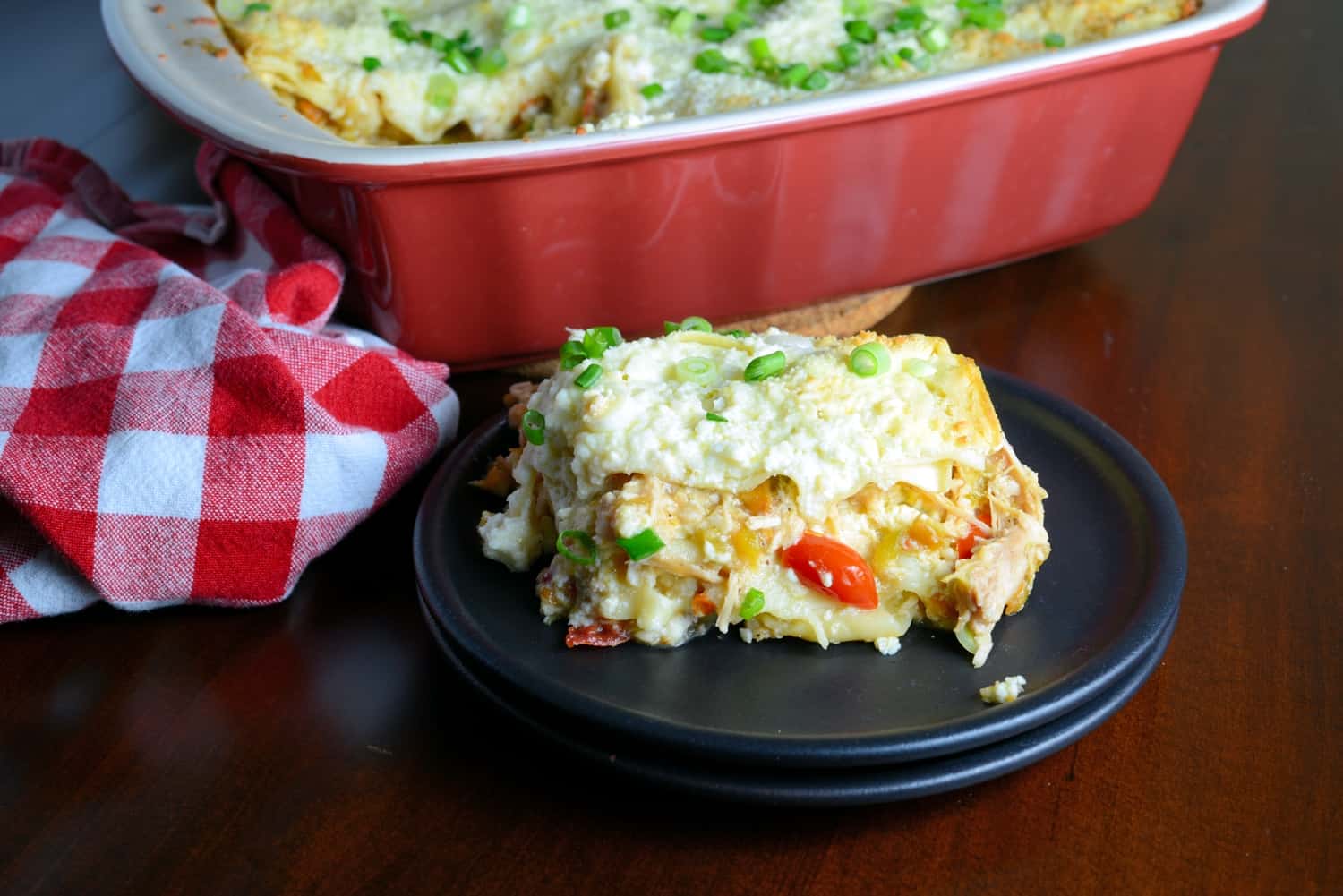 Green Chile Chicken Lasagna Recipe- it’s like a green chile enchilada chicken casserole and a lasagna recipe with ricotta smashed together. One of my best Hatch green chile recipes, it will soon be your favorite weeknight meal using pre-cooked chicken and no-bake lasagna noodles, it comes together in a snap! www.savoryexperiments.com