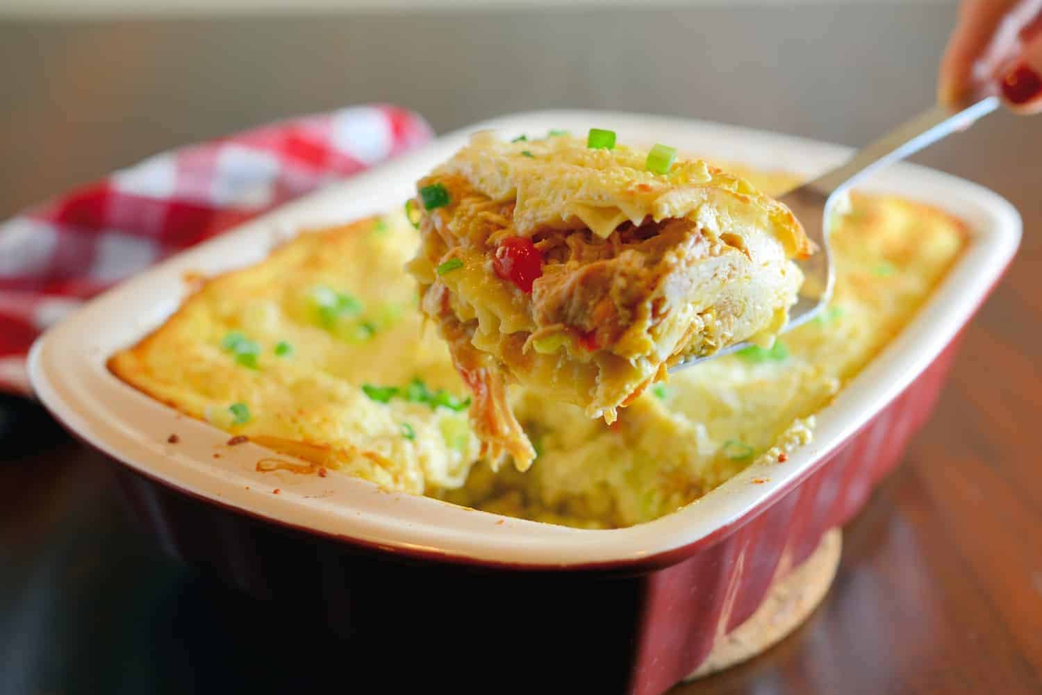 Green Chile Chicken Lasagna is a make-ahead and freezer friendly meal layering no-bake lasagna noodles with shredded chicken, spices, green chiles and lots of cheese! #chickenlasagna #mexicanlasagna www.savoryexperiments.com