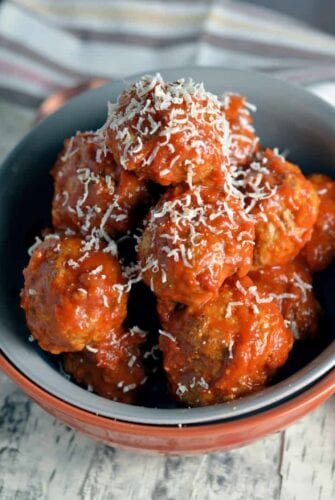 Looking for good Italian food? Start with the BEST Italian Meatball recipe! Perfectly tender and flavorful, you will never guess some of this Italian girls tricks for making award winning meatballs!
