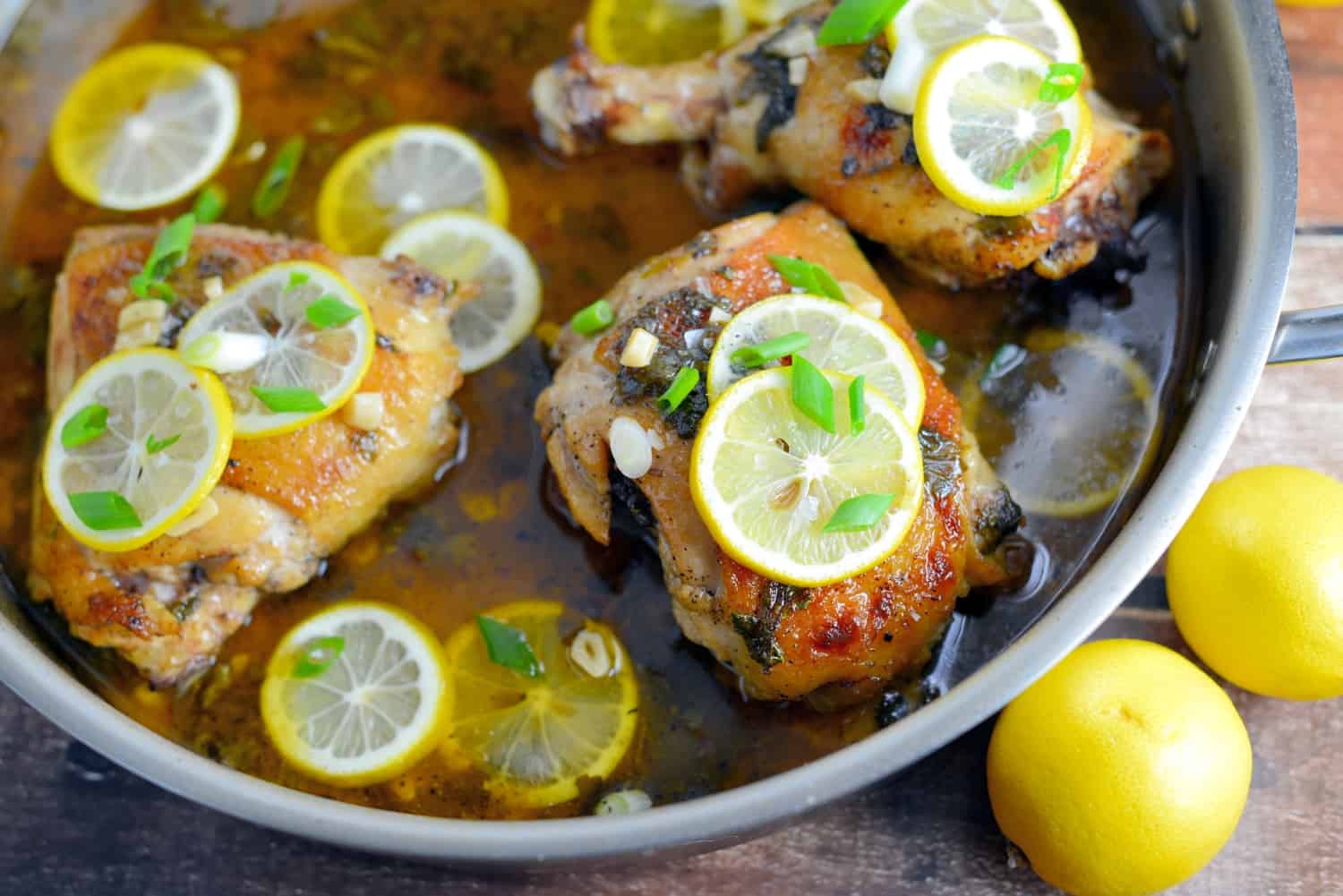 Lemon Garlic Chicken Recipe: This is one-pan dish is the best lemon chicken recipe out there! Use chicken breast, thighs or drumsticks. Tender and flavorful, serve this easy recipe over toasted couscous. www.savoryexperiments.com