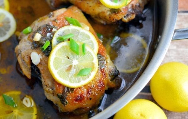 Lemon Garlic Chicken Recipe- the best lemon chicken recipe out there. Garlic and honey make this sauce bright and tasty! Serve lemon chicken over pasta, rice or toasted couscous. www.savoryexperiments.com Lemon Garlic Chicken Recipe- the best lemon chicken recipe out there. Garlic and honey make this sauce bright and tasty! Serve lemon chicken over pasta, rice or toasted couscous. www.savoryexperiments.com