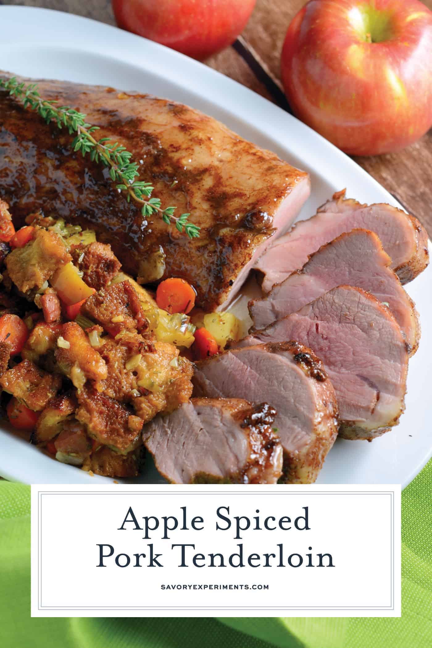 Apple Spiced Pork Tenderloin is a pork tenderloin recipe that will blow you away with aromatic spices and an apple jelly glaze, surrounding with fresh apple and ham stuffing, all cooked on the same baking sheet. #porktenderloinrecipe www.savoryexperiments.com