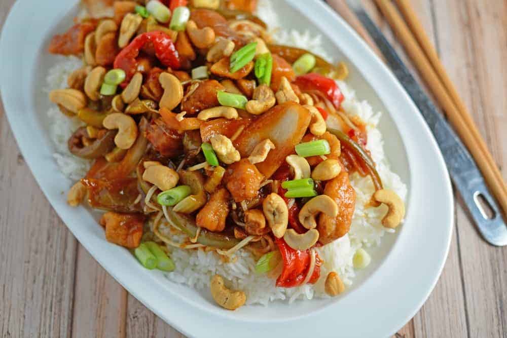 Crockpot Cashew Chicken Recipe- better than take-out, this cashew chicken recipe is one of the best crock pot meals you will ever taste! I added this to my “best slow cooker recipes” file. Tasty Asian sauce with loads of vegetables. www.savoryexperiments.com