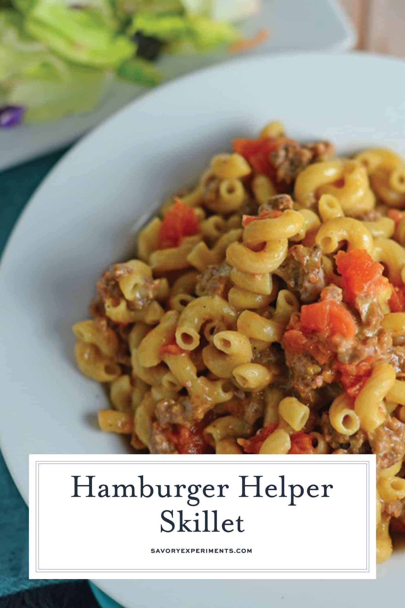 Homemade Hamburger Helper Skillet is a great ground beef recipe with cheddar cheese, seasonings and tomatoes all ready in 20-minutes! #hamburgerhelper #onedishmeal #castironskilletrecipes #groundbeefrecipes www.savoryexperiments.com