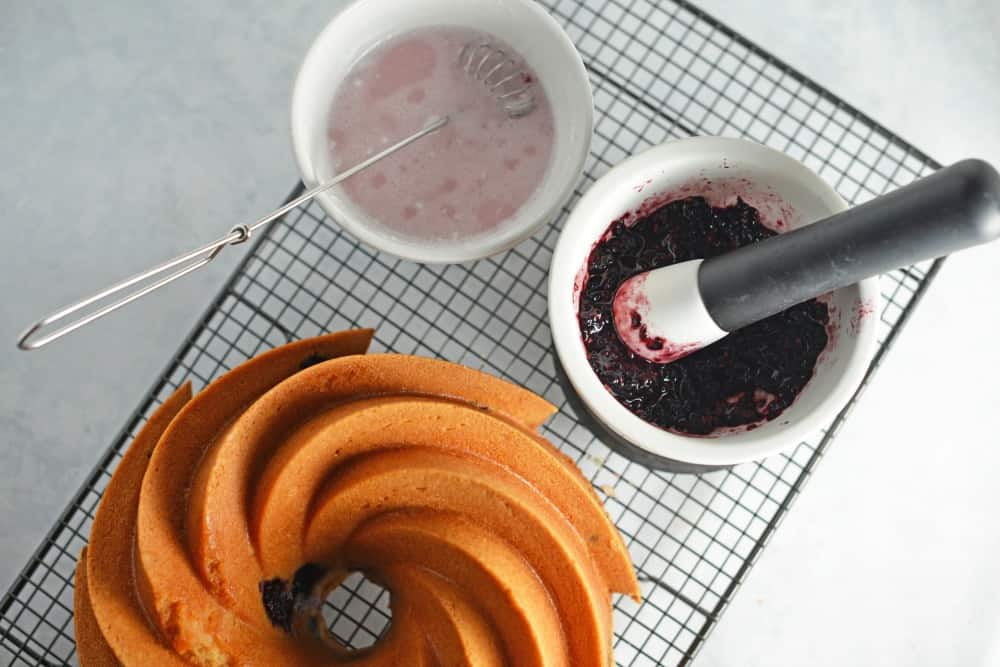 Blackberry Bundt Cake Recipe- my favorite blackberry recipes using fresh blackberries and Blackberry Ginger Ale to make a moist and decadent bundt cake. The consistency of pound cake, it is ideal for brunch, tea or dessert. www.savoryexperiments.com