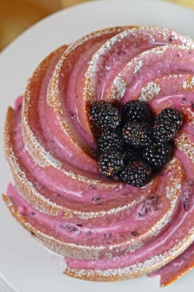 Blackberry Bundt Cake Recipe- my favorite blackberry recipes using fresh blackberries and Blackberry Ginger Ale to make a moist and decadent bundt cake. The consistency of pound cake, it is ideal for brunch, tea or dessert. www.savoryexperiments.com