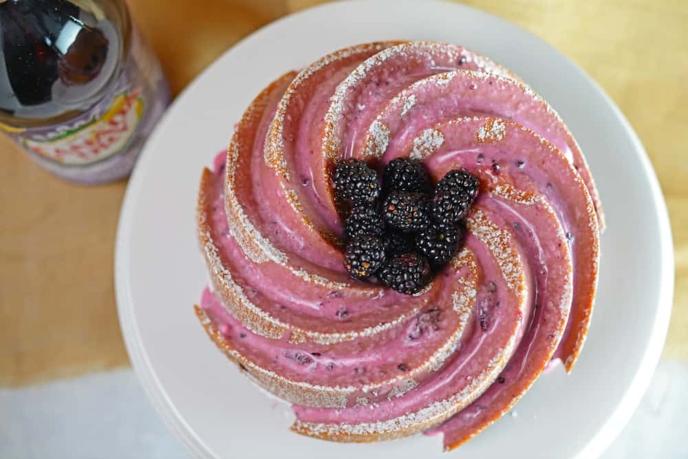 Blackberry Bundt Cake Recipe- my favorite blackberry recipes using fresh blackberries and Blackberry Ginger Ale to make a moist and decadent bundt cake. The consistency of pound cake, it is ideal for brunch, tea or dessert. www.savoryexperiments.com