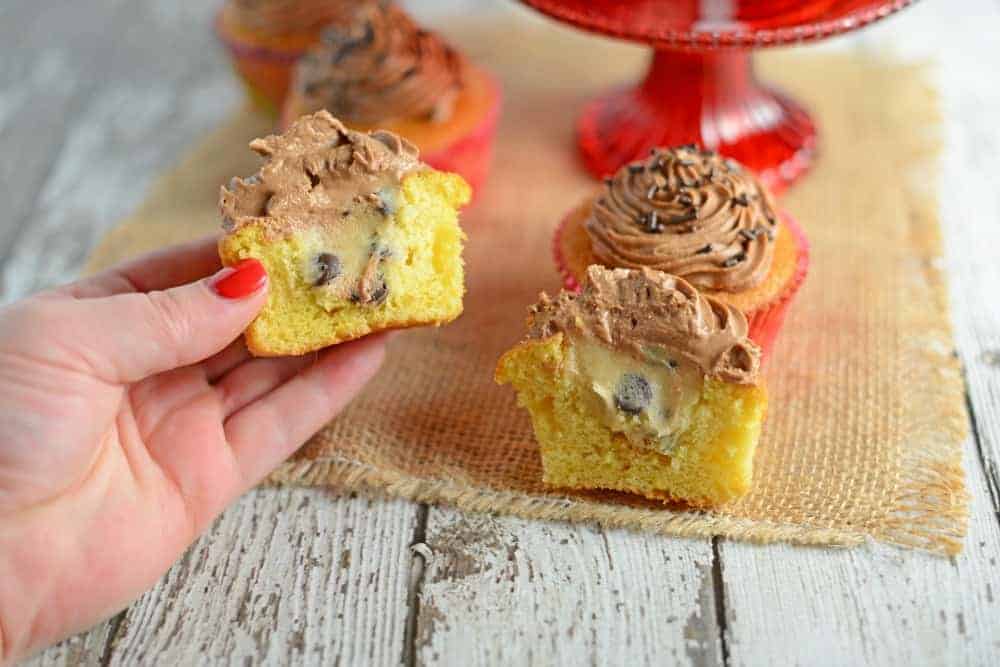 Cookie Dough Stuffed Cupcakes- great cupcake idea for kids birthday parties! Easy cupcake decorating idea for anyone to try. www.savoryexperiments.com