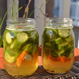 Honey Habanero Pickles - It only takes a few minutes to make Easy Refrigerator Honey Habanero Pickles. Once you make your own homemade version, you'll never buy store bought again- these are spicy and sweet and are ready in just 1 week! www.savoryexperiments.com