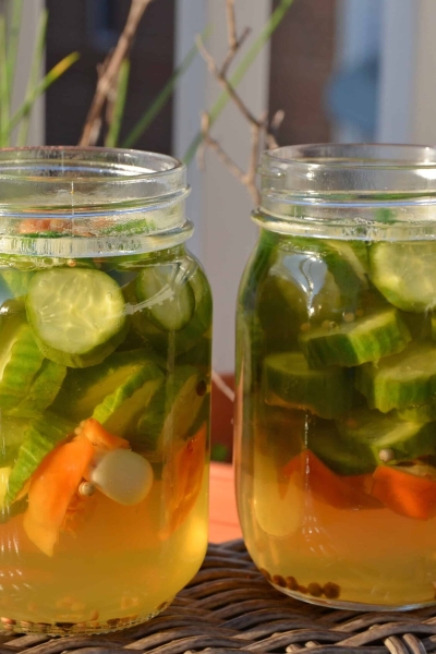 Honey Habanero Pickles - It only takes a few minutes to make Easy Refrigerator Honey Habanero Pickles. Once you make your own homemade version, you'll never buy store bought again- these are spicy and sweet and are ready in just 1 week! www.savoryexperiments.com