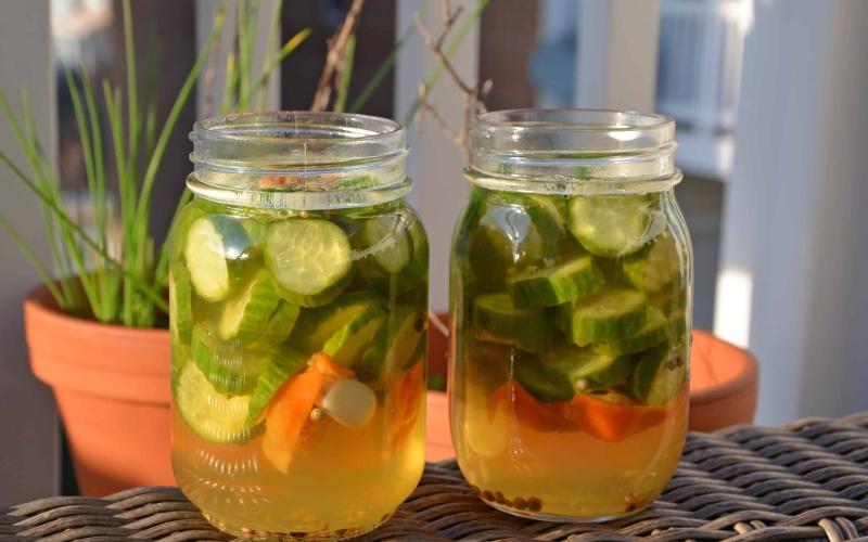 Honey Habanero Pickles - It only takes a few minutes to make Easy Refrigerator Honey Habanero Pickles. Once you make your own homemade version, you'll never buy store bought again- these are spicy and sweet and are ready in just 1 week! www.savoryexperiments.com