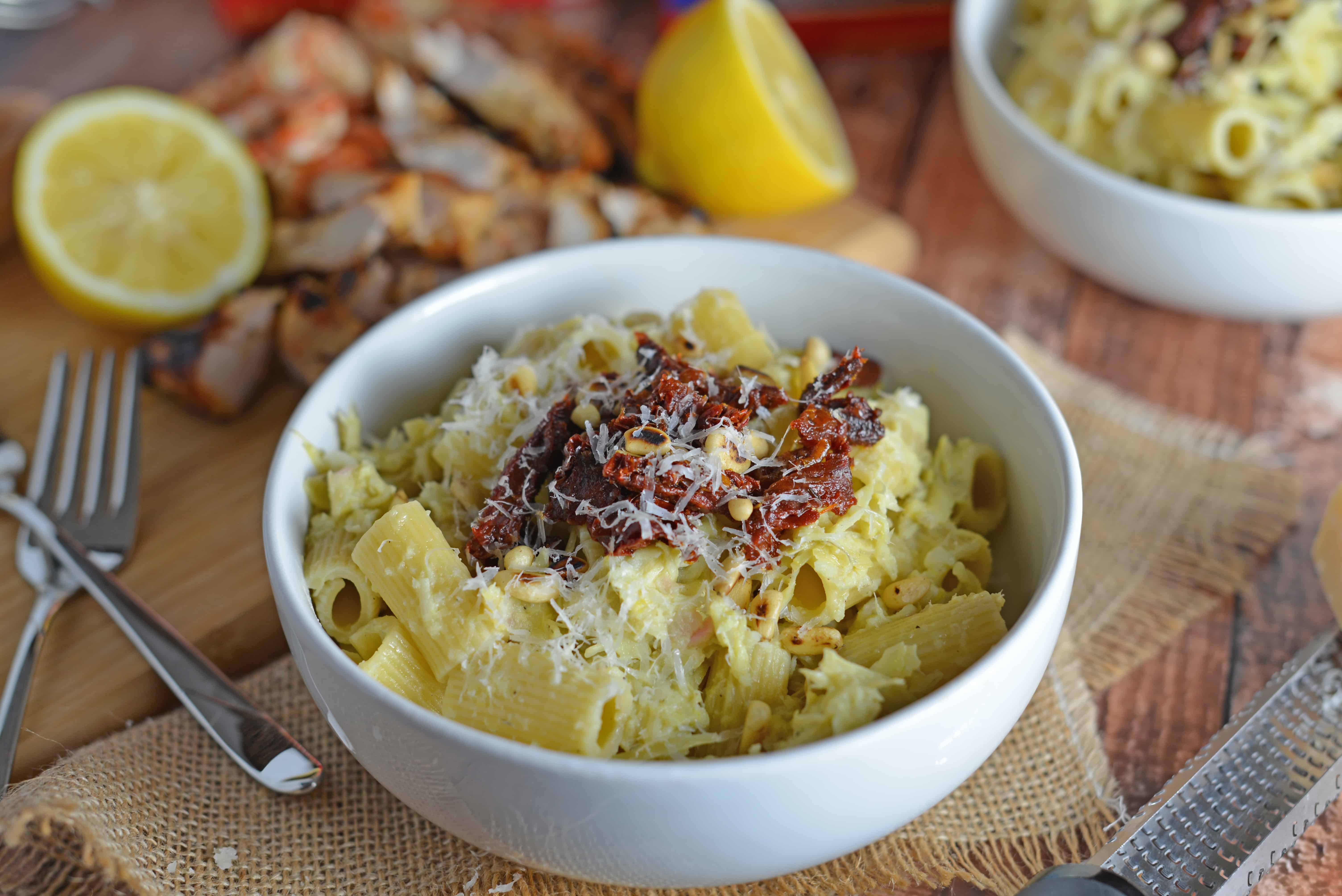 Lemony Artichoke Pesto is a fresh and punchy sauce perfect for summer meals and pasta. Takes only minutes to make, stores and freezes well and makes an excellent gift. Top with pine nuts, sun dried tomatoes and Parmesan Reggiano cheese. www.savoryexperiments.com