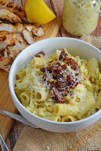 Lemony Artichoke Pesto is a fresh and punchy sauce perfect for summer meals and pasta. Takes only minutes to make, stores and freezes well and makes an excellent gift. Top with pine nuts, sun dried tomatoes and Parmesan Reggiano cheese. www.savoryexperiments.com