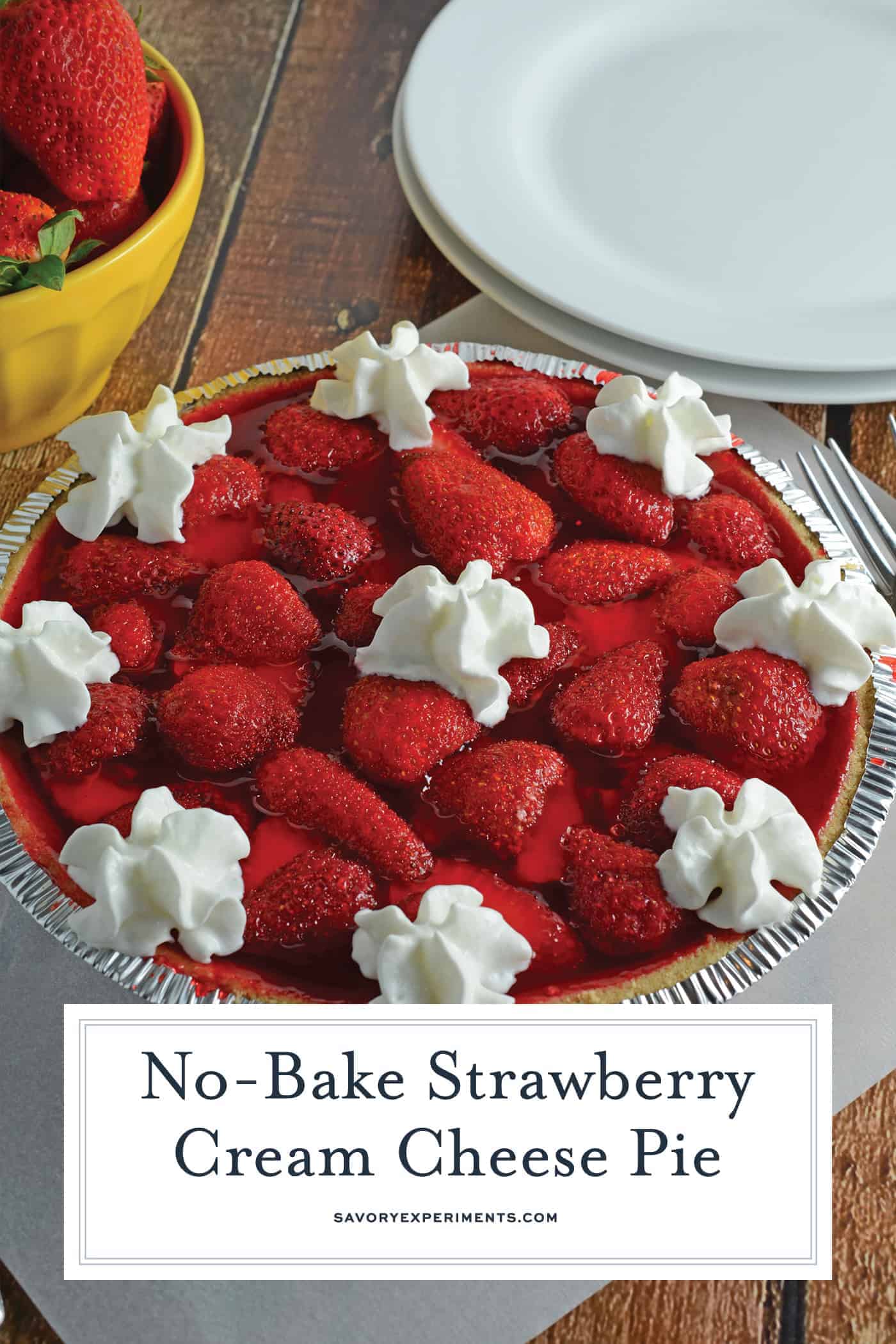 No-Bake Strawberry Cream Cheese Pie- A no-bake pie made with graham cracker crust, a layer of sweet cream cheese, loads of fresh strawberries and a homemade strawberry jelly. All ready in less than 20 minutes! www.savoryexperiments.com