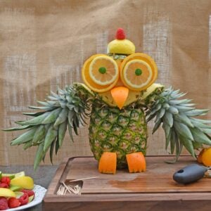 Pineapple Owl Fruit Sculpture- take melon craving to a whole new level with this cute fruit animal owl. This fruit carving idea only takes 15 minutes and is super easy, without much actual “carving” at all. Plus, pineapple recipes so your pineapple owl doesn’t go to waste. www.savoryexperiments.com
